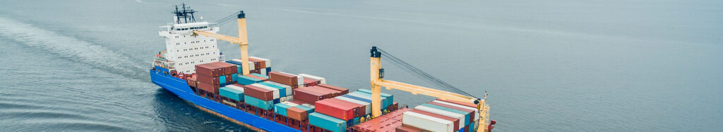 Container vessel sailing in open sea